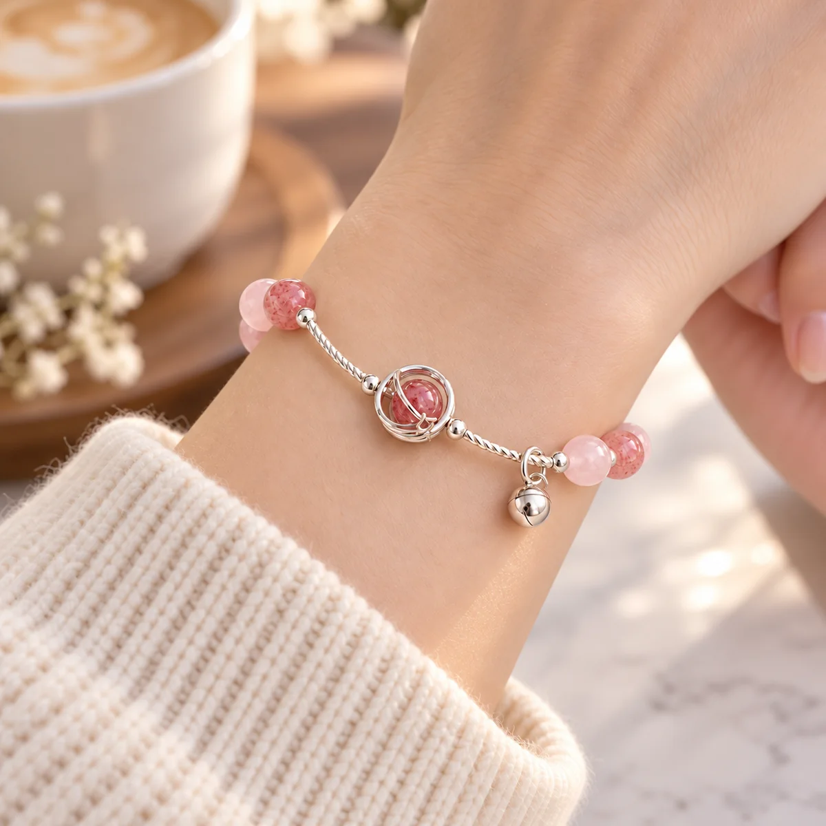 Starlight Strawberry Quartz Bracelet worn on the wrist